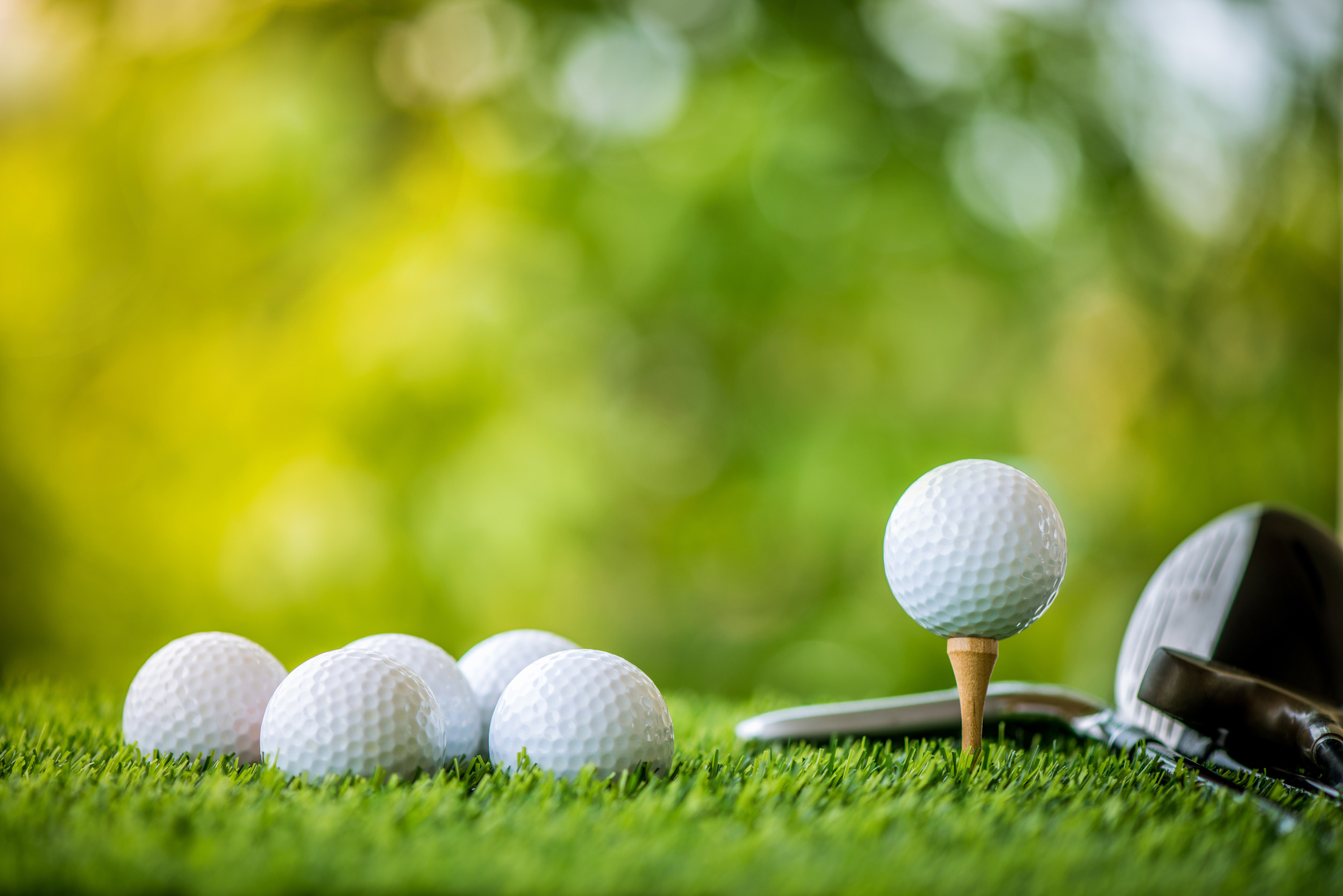 golf ball on tee ready to practice